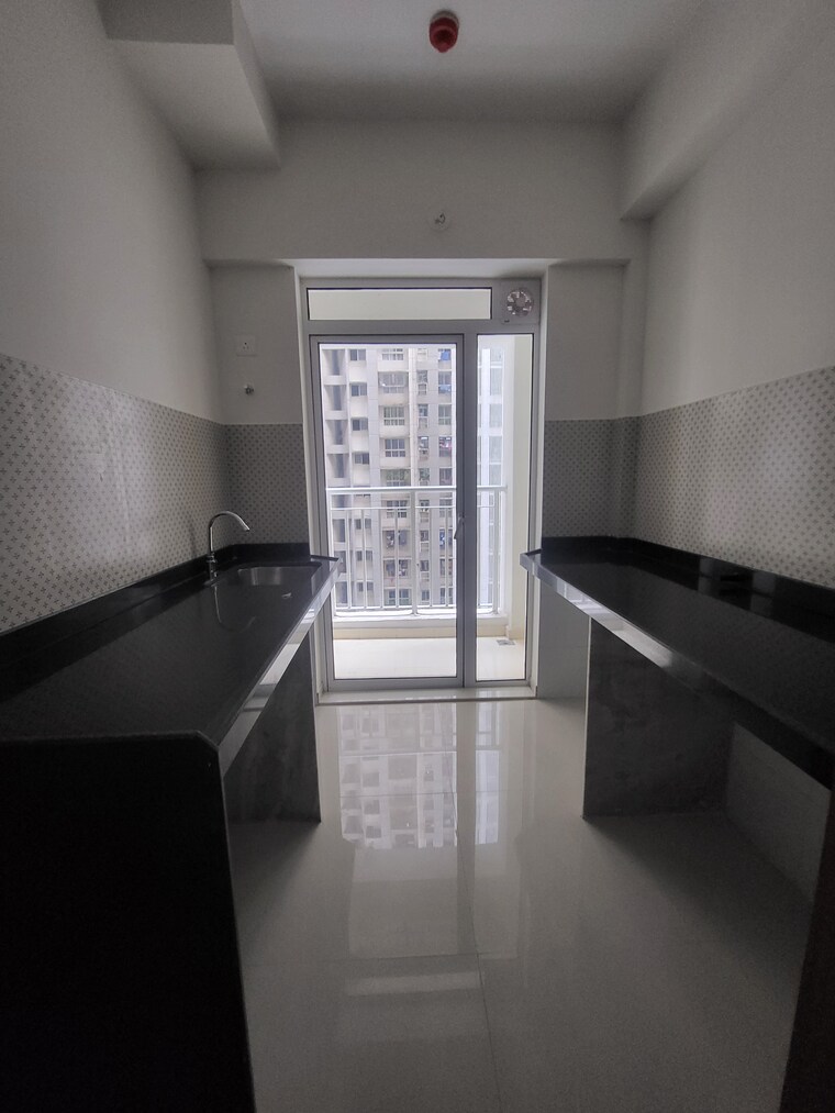 Kitchen, lodha-amara 1 Bedroom 453 Sq.Ft. Apartment In Kolshet Road Thane 9499602