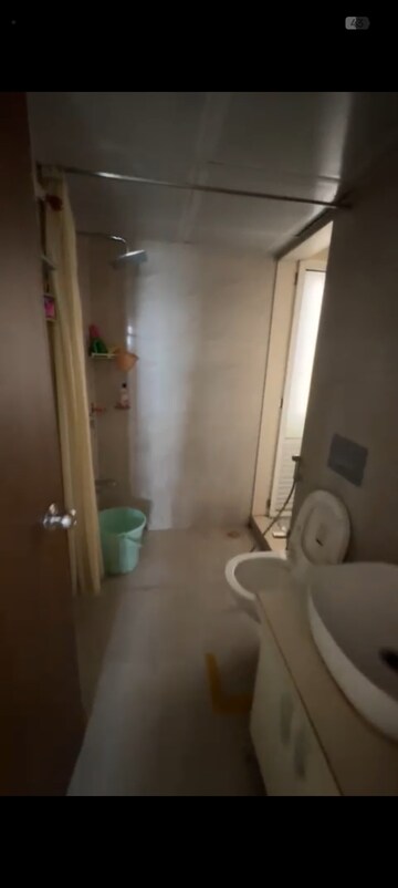 Bathroom in 1.5 BHK Apartment at Dosti West County, Balkum Pada – for Rent
