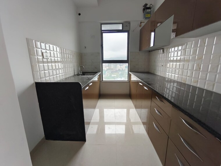 Kitchen, kalpataru-immensa 2 Bedroom 632 Sq.Ft. Apartment In Kolshet Road Thane 9499799