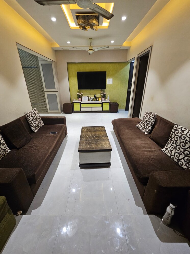 Living Room, ng-suncity 2 Bedroom 871 Sq.Ft. Apartment In Kandivali East Mumbai 9499893