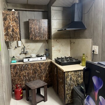 Kitchen in 1.5 BHK Apartment at Metro Trade Center, Vip Road – for Rent