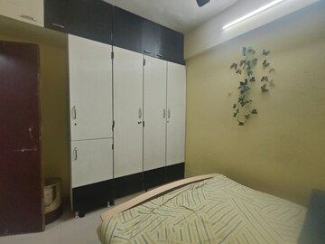 Bedroom in 1 BHK Apartment at Tulsi Darshan Society, Kopar Khairane – for Rent