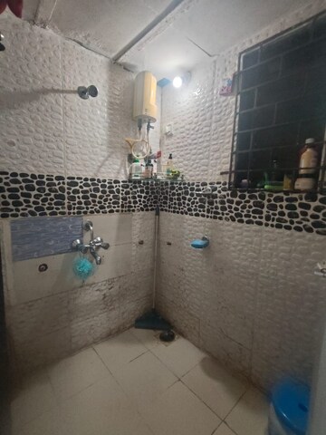 Bathroom in 1 BHK Apartment at Tulsi Darshan Society, Kopar Khairane – for Rent