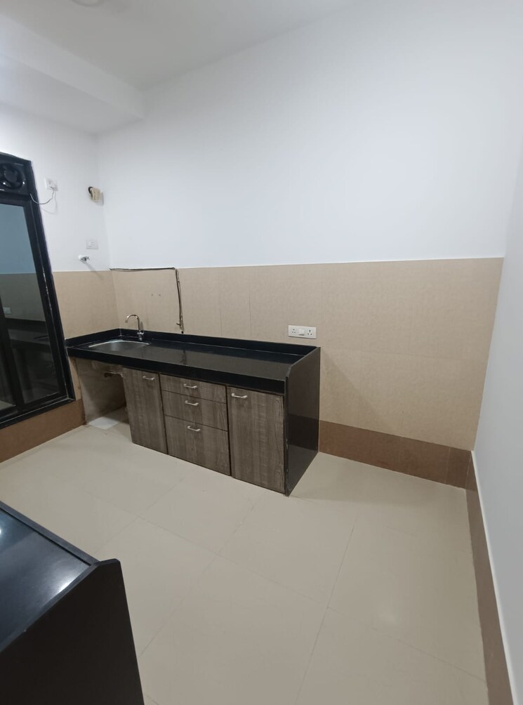 Kitchen, rustomjee-elanza 2 Bedroom 730 Sq.Ft. Apartment In Malad West Mumbai 9499945