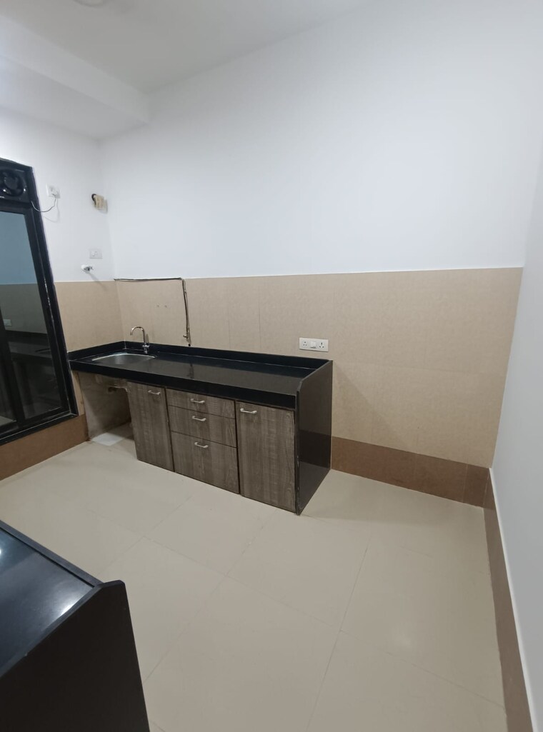Kitchen, rustomjee-elanza 2 Bedroom 730 Sq.Ft. Apartment In Malad West Mumbai 9499945
