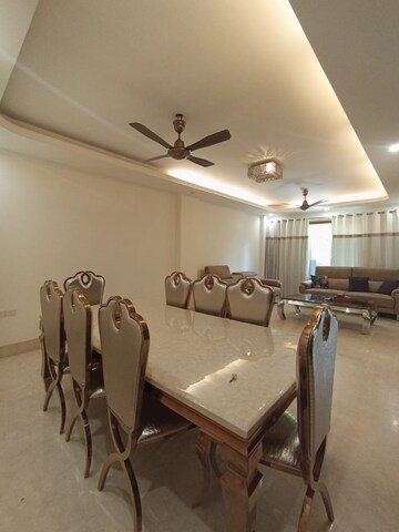 Living Room in 3 BHK Apartment at Pamposh Enclave – for Rent