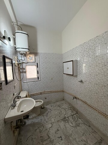 Bathroom in 2 BHK Builder Floor at Kalkaji – for Rent
