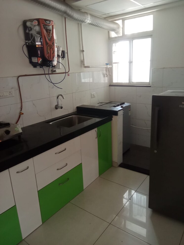 Kitchen, kolte-patil-life-republic-oro-avenue 1 Bedroom 425 Sq.Ft. Apartment In Hinjewadi Pune 9500041