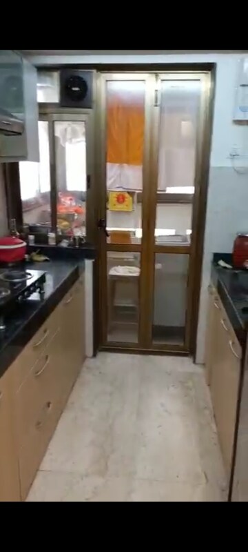 Kitchen in 2 BHK Apartment at Rustomjee Elements, Andheri West – for Rent