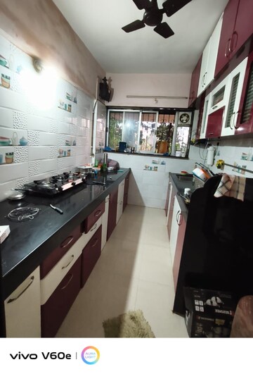 Kitchen in 2.5 BHK Apartment at Ganga Sarovar, Wadgaon Sheri – for Rent