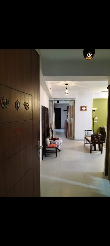 Living Room in 4 BHK Apartment at Nimbus The Hyde park, Sector 78 – for Rent
