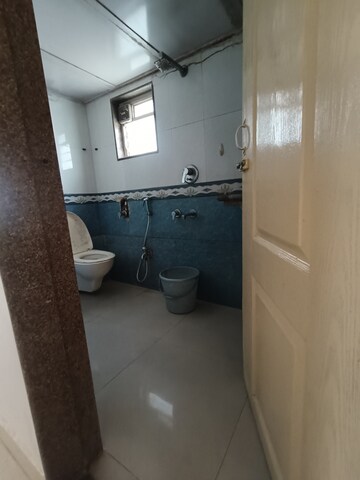 Bathroom in 1 BHK Apartment at Hilton Tower, Andheri East – for Rent