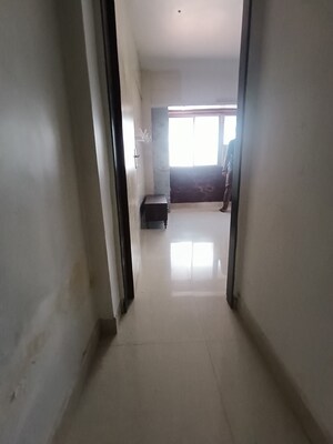 Building Lobby in 1 BHK Apartment at Hilton Tower, Andheri East – for Rent