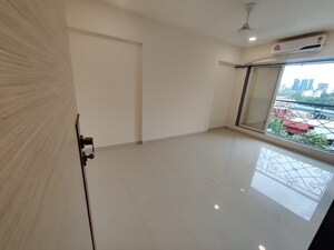 Room in 2 BHK Apartment at Aqua Marine, Bandra West – for Rent
