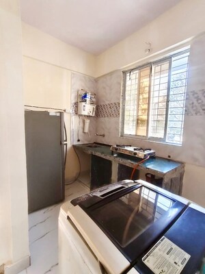 Kitchen in 1 BHK Apartment at Seawoods Sector 36 – for Rent