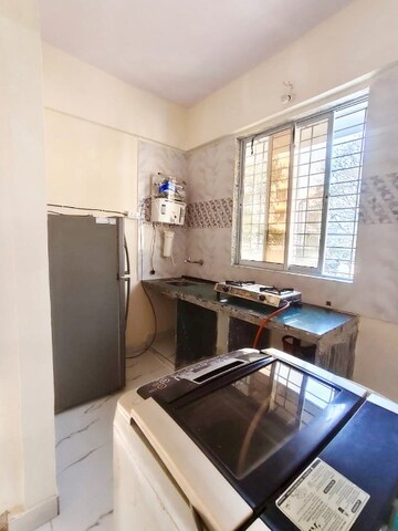 Kitchen in 1 BHK Apartment at Seawoods Sector 36 – for Rent