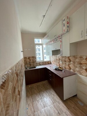 Kitchen in 2 BHK Apartment at Nilaya Greens, Raj Nagar Extension – for Sale