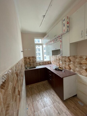 Kitchen in 2 BHK Apartment at Nilaya Greens, Raj Nagar Extension – for Sale