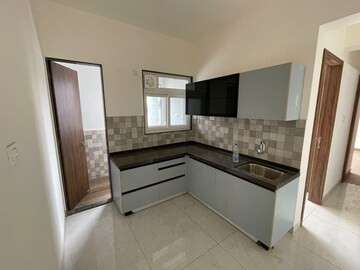 Kitchen in 2 BHK Apartment at D And T Mountain View CHS, Senapati Bapat Road – for Rent