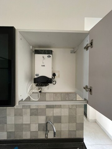 Kitchen in 2 BHK Apartment at D And T Mountain View CHS, Senapati Bapat Road – for Rent