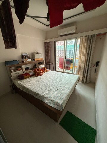 Bedroom in 2 BHK Apartment at Shraddha Vertica, Vikhroli East – for Rent