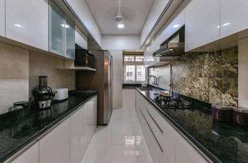Kitchen in 2 BHK Apartment at Ochna Pride Park CHS Ltd, Ghodbunder Road – for Rent