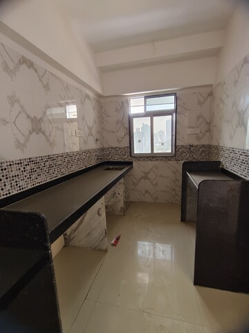 Kitchen in 1 BHK Apartment at DGS Sheetal Tapovan, Malad East – for Rent