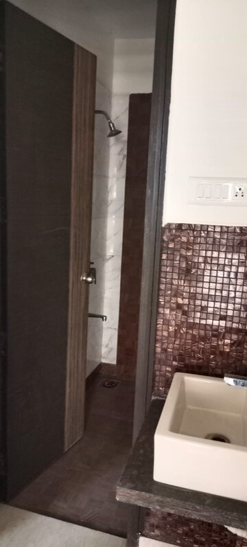 Bathroom in 1 BHK Apartment at Tharwani Vedant Millenia, Titwala – for Rent