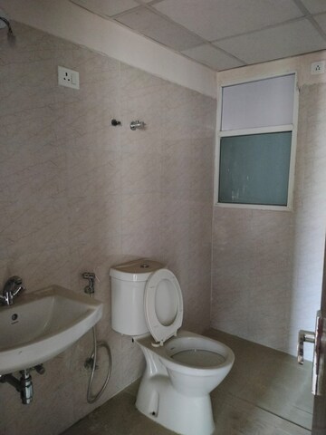 Bathroom in 3 BHK Apartment at Amrapali Golf Homes, Sector 4 Greater Noida – for Sale
