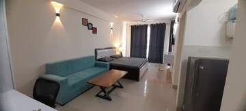 Living Room in 1 RK Apartment at Urbtech Xaviers, Sector 168 – for Rent