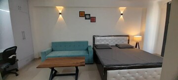 Master Bedroom in 1 RK Apartment at Urbtech Xaviers, Sector 168 – for Rent