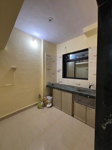 Kitchen in 1 BHK Apartment at Gayatri Dham CHS, Titwala – for Sale