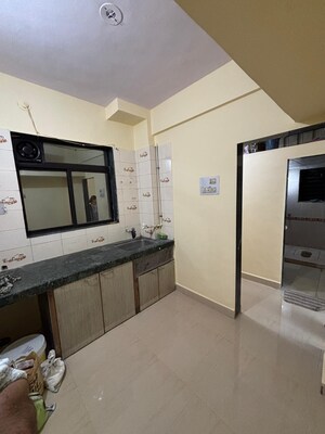 Kitchen in 1 BHK Apartment at Gayatri Dham CHS, Titwala – for Sale