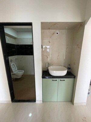 Bathroom in 2 BHK Apartment at Mhada 24 LIG Apartments, Goregaon West – for Rent