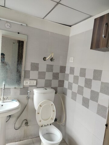 Bathroom in 4 BHK Apartment at Gaur Atulyam, Omicron I Greater Noida – for Rent
