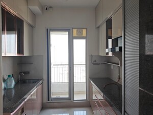 Kitchen in 2 BHK Apartment at Piramal Vaikunth, Balkum Pada – for Rent