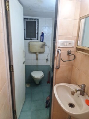 Bathroom in 2 BHK Apartment at Rajgir CHS, Andheri East – for Rent