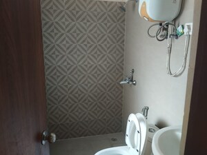 Bathroom in 3 BHK Apartment at VVIP Homes, Gaur City 2 – for Rent