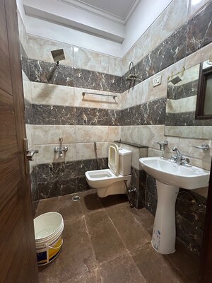 Bathroom in 3 BHK Builder Floor at Chattarpur – for Rent