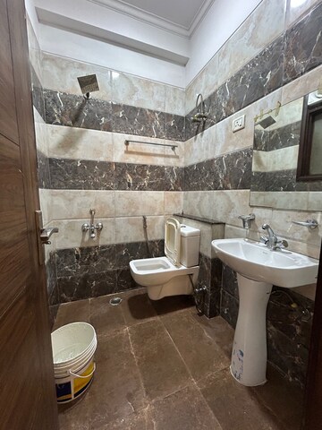 Bathroom in 3 BHK Builder Floor at Chattarpur – for Rent