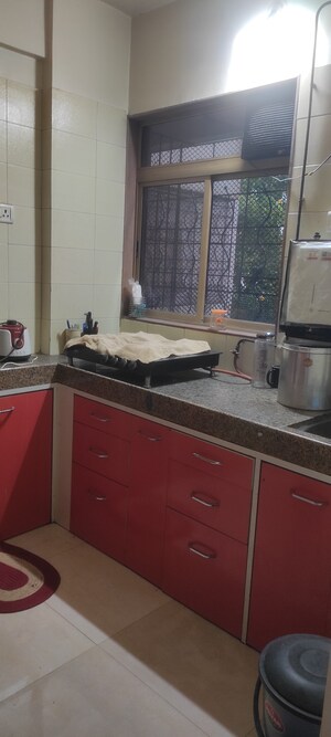 Kitchen in 2 BHK Apartment at Charms Residency CHS, Brahmand – for Sale