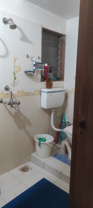 Bathroom in 2 BHK Apartment at Charms Residency CHS, Brahmand – for Sale