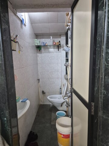 Bathroom in 1 BHK Apartment at Saraf Choudhari Nagar CHS, Kandivali East – for Sale