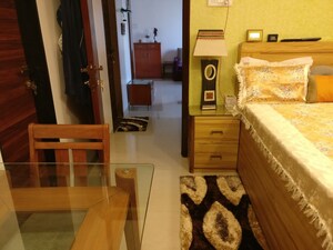 Living Room in 1 BHK Apartment at K Raheja Heights, Malad East – for Rent