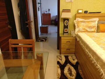 Living Room in 1 BHK Apartment at K Raheja Heights, Malad East – for Rent