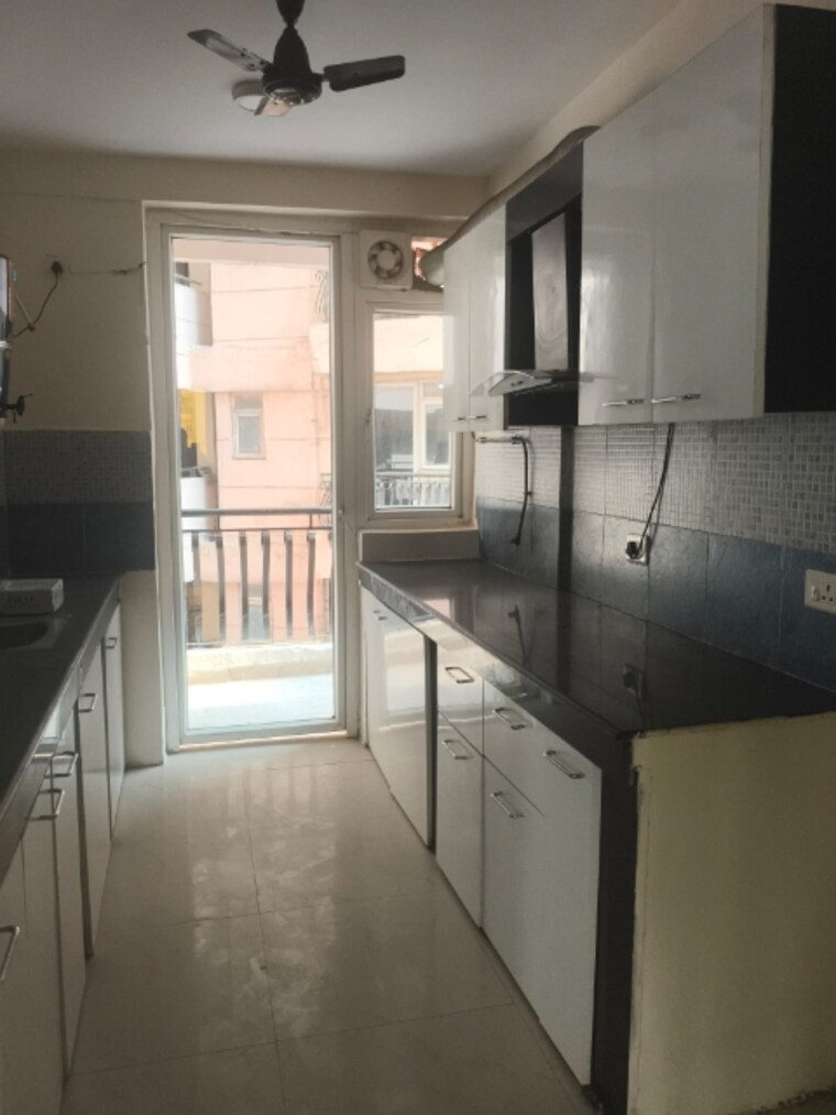 Kitchen, sikka-karmic-greens 2.5 Bedroom 1265 Sq.Ft. Apartment In Sector 78 Noida 9501762