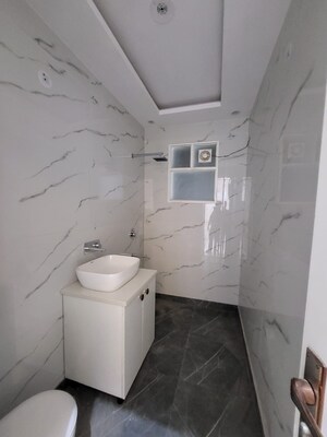 Bathroom in 4 BHK Builder Floor at Green Fields Colony – for Rent