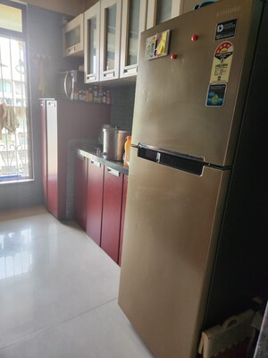 Kitchen in 2 BHK Apartment at Tharwani Rosewood Heights, Kharghar Sector 10 – for Rent
