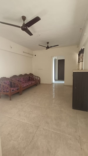 Living Room in 1 BHK Apartment at Lodha Palava Downtown, Dombivli East – for Rent