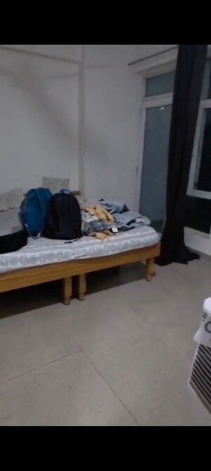 Bedroom in 2.5 BHK Apartment at Gaur City 6th Avenue, Sector 4 Greater Noida – for Rent